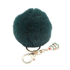 Porte-clés pompon en fausse fourrure vert foncé avec breloque sapin de Noël dorée