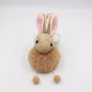 Cute plush bunny fur ball keychain with khaki ears and golden metal clasp for bags
