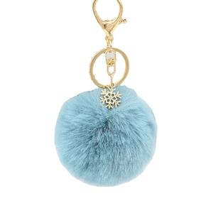 Light blue fluffy faux fur keychain with golden snowflake charm and metal clasp