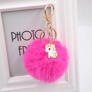 Porte-clés licorne à pompon fuchsia avec fermoir doré pour sacs à main et voitures