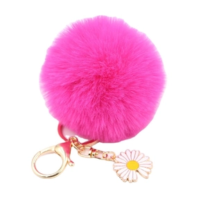 Porte-clés pompon rose vif en fausse fourrure avec breloque marguerite et fermoir doré