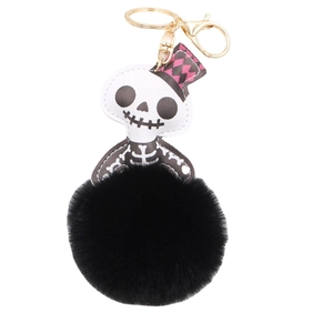 Portachiavi Halloween teschio in pelle con pompon nero e gancio metallico dorato