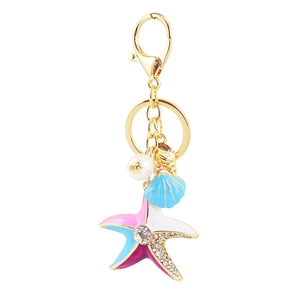 Portachiavi creativo a forma di stella marina con conchiglia blu e perla bianca dorata
