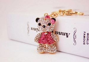 Detailed view of the crystal teddy bear keychain with pink rhinestones and gold lobster clasp