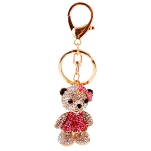 Crystal teddy bear keychain with pink dress and lobster clasp on white background