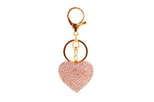 Close-up of pink crystal heart keychain with sparkling rhinestones and gold clasp