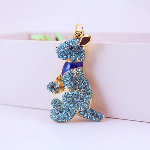 Porte-clés pendentif kangourou doré avec cristaux bleu ciel et motif maman-bébé