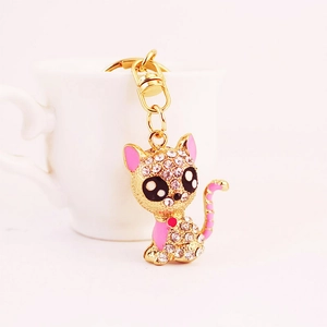 Sparkling rhinestone kitten keychain in gold metal for women handbags and accessories