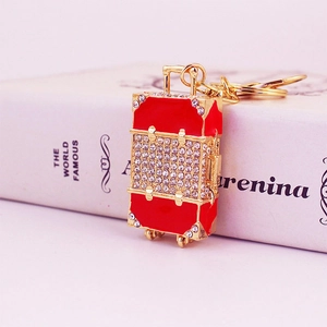 Sparkling crystal encrusted red suitcase keychain with golden metal ring for handbags