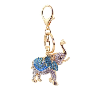 Porte-clés éléphant étincelant avec émail bleu et finition en alliage doré brillant