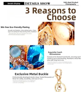 Detailed macro view of gold-plated alloy flower keychain with blue crystals and lobster clasp