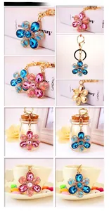 Detail showing colorful crystal flower keychains with gold lobster clasp for women