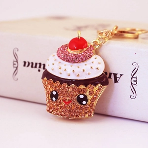 Sparkling crystal rhinestone cupcake keychain accessory with pink diamonds and gold finish