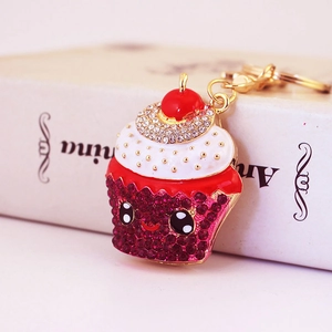 Sparkly crystal cupcake keychain with pink rhinestones and a red cherry on gold chain