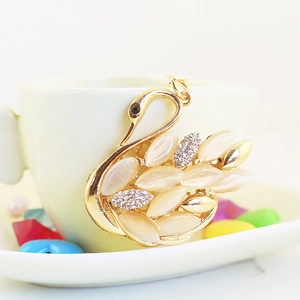Elegant gold swan keychain with marquise cat eye stones and rhinestones for bags