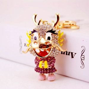 Exquisite Chinese zodiac dragon keychain with white and purple rhinestones on gold base