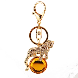 Porte-clés léopard étincelant avec cristaux et pendentif en pierre précieuse ambre doré