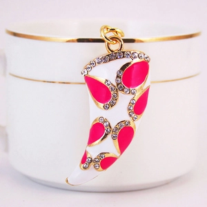 Porte-clés instrument en forme de cor avec strass roses et émail blanc chic