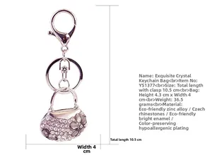Detail view of rhinestone mini bag keychain with dimensions and silver metal plating