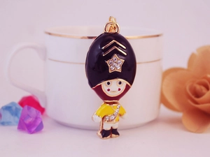 Detail of royal guard keychain with sparkling rhinestones and enamel finish craft