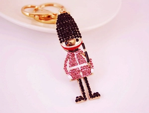 Detail of creative British Royal Guard keychain with pink and black rhinestone crystals