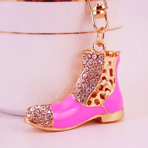 Pink rhinestone waterdrop boot keychain with gold-plated lobster clasp and floral cutout