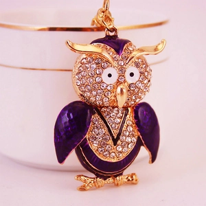 Charming purple owl keychain with crystal rhinestones on a golden alloy branch base
