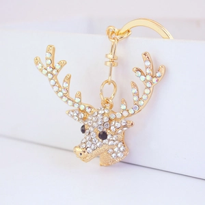 Sparkling crystal deer head keychain in gold finish with white and AB rhinestones