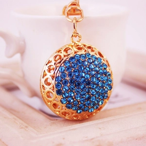 Porte-clés boule de cristal avec strass bleu foncé et pendentif en métal doré