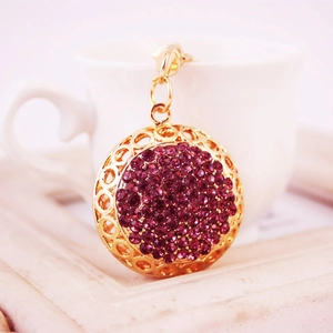 Porte-clés boule de cristal étincelant avec motif doré et strass violets brillants
