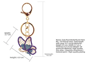 Detailed size chart of blue rhinestone butterfly keychain with dimensions and materials
