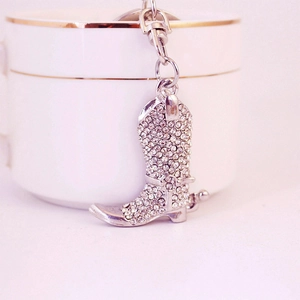 Porte-clés botte de cowboy argentée avec strass scintillants et fermoir mousqueton robuste