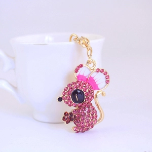 Cute mouse keychain with pink crystal rhinestones and enamel details on white cup