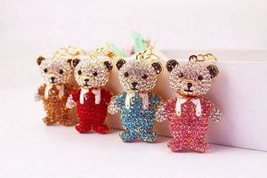 Set of crystal teddy bear keychains in brown, red, blue, and pink colors