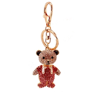 Sparkly crystal teddy bear keychain with red and champagne rhinestones on gold ring