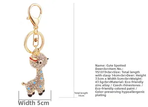 Detailed view of rhinestone giraffe keychain with dimensions and weight measurements
