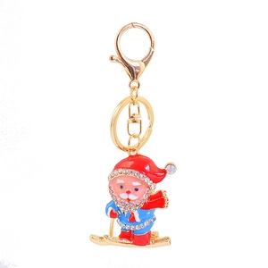 Creative Christmas Santa Claus skiing keychain with colorful enamel and sparkling rhinestones