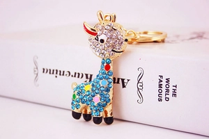 Detail of giraffe keychain featuring colorful rhinestones and gold alloy hardware