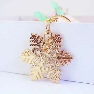 Porte-clés flocon de neige doré avec strass et perle pour accessoire de sac femme