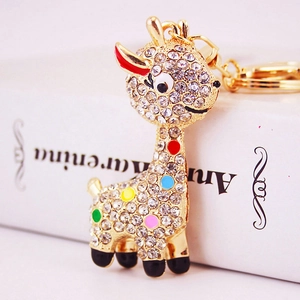 Sparkling rhinestone giraffe keychain with colorful enamel spots and gold-plated finish