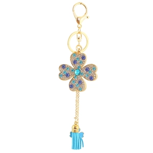 Porte-clés trèfle à quatre feuilles créatif avec strass colorés et pompon bleu clair