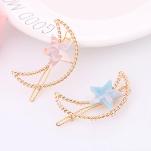 Lot de deux pinces à cheveux lune dorée avec étoiles marbrées rose et bleue élégantes