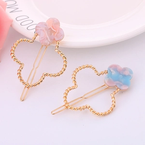 Barrettes à fleurs en acétate avec cadre doré torsadé, finitions marbrées rose et bleu