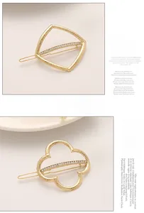 Detail of golden clover and diamond-set geometric hair clips with hammered texture