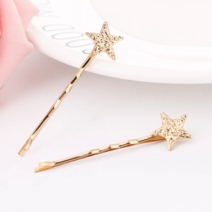Minimalist gold star hair clips with hammered metal texture for women, set of two