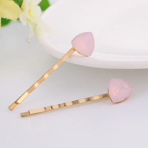 Minimalist gold metal bobby pins set with pink geometric crystal accents for women
