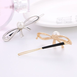 Elegant bow-shaped alloy hair clips with pearls in gold and silver finishes