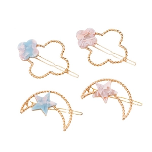 Lot de 4 barrettes trèfle et lune en acrylique marbré avec monture en métal doré