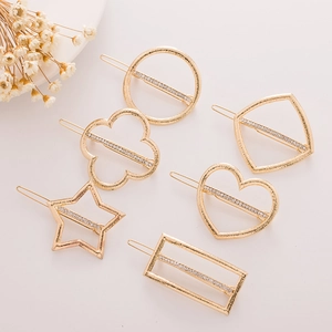Set of six gold geometric hair clips with sparkling rhinestones and matte finish