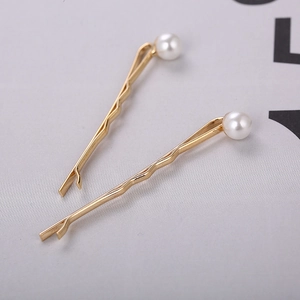Ensemble de barrettes dorées ondulées minimalistes avec deux perles blanches